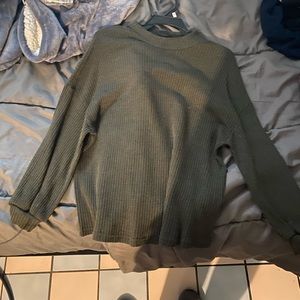 Green shirt sweater